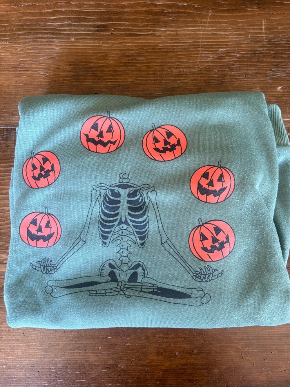 Green Halloween Sweatshirt with Skeleton and Jack-O'-Lanterns